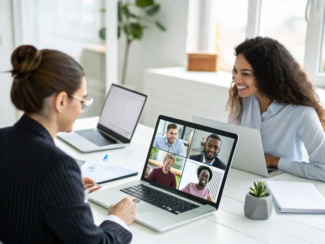 An image showcasing a team collaborating over digital communication tools, highlighting the efficiency of AI-driven solutions.